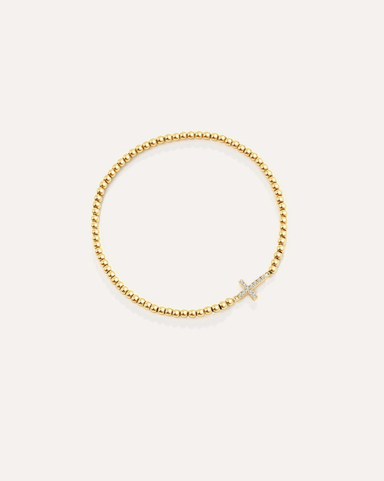 Gold Beaded Cross Stretch Bracelet by MATCHIN