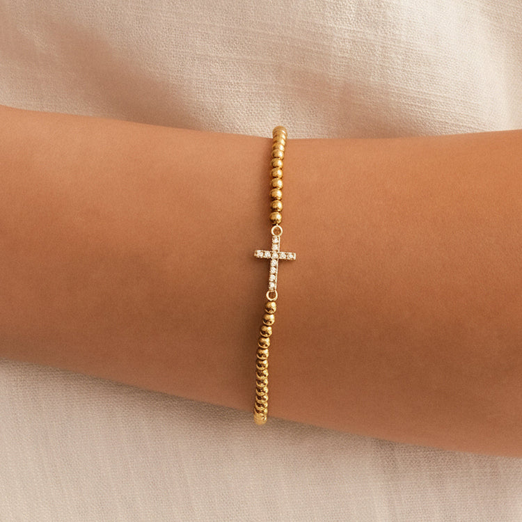 21-stretch_cross_charm_bracelet_model_2.jpg