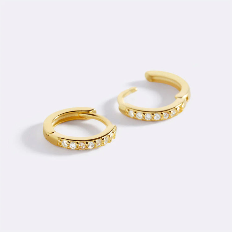 68-new_pave_huggie_hoops_1_gold_c3c6dd40-ed30-4660-94fb-38b95eea84e6.jpg